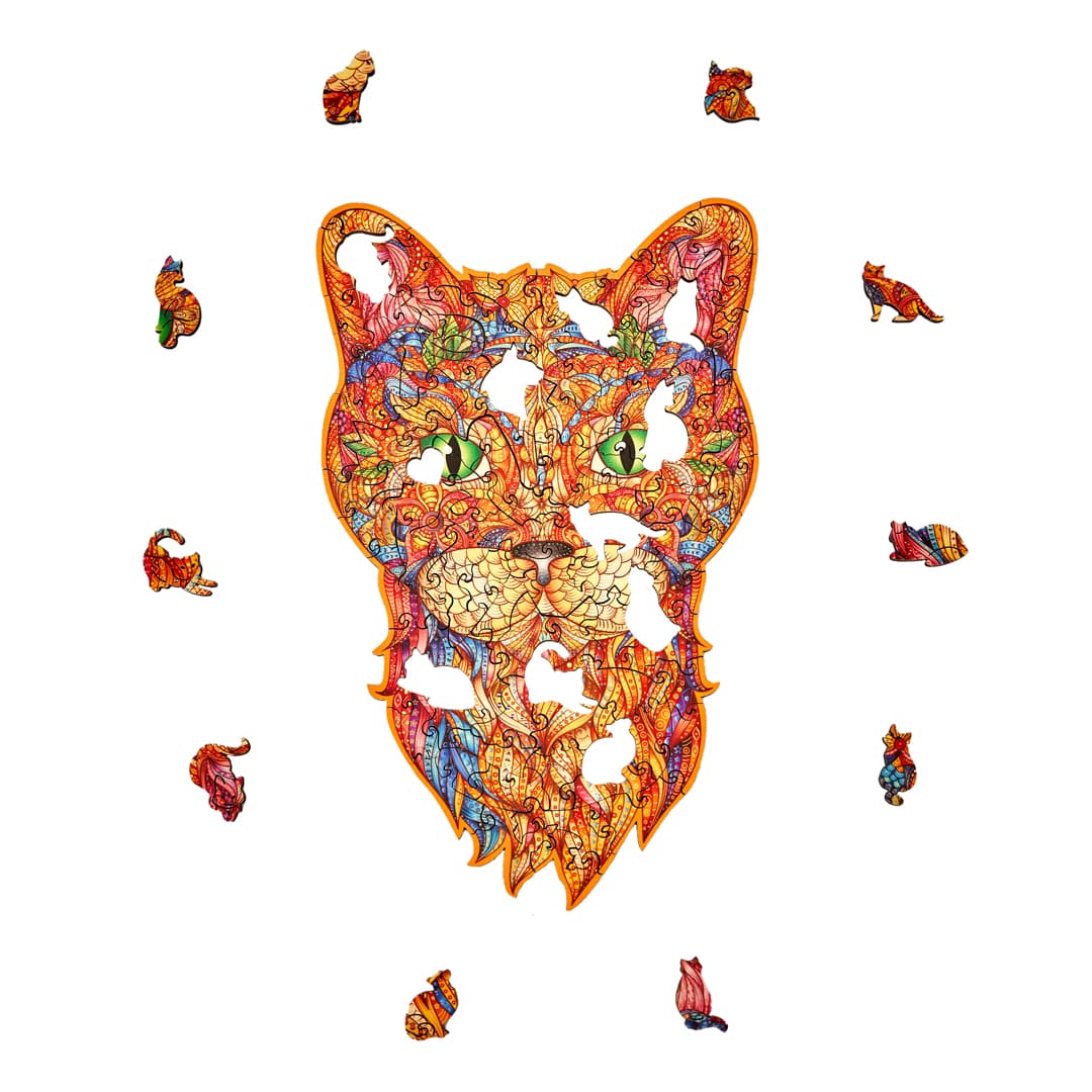 Colorful cat head design with smaller cat figures around wooden puzzle on a white background