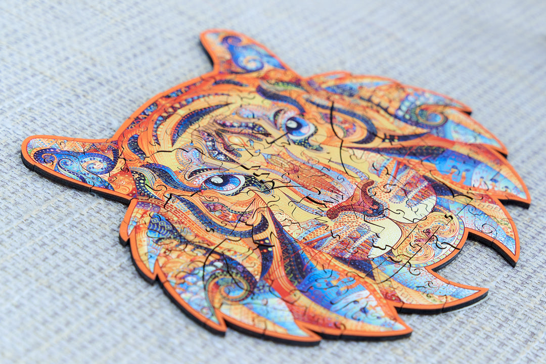 The Magic Tiger wooden puzzle assembled on a woven blanket, every edge a point or a curve